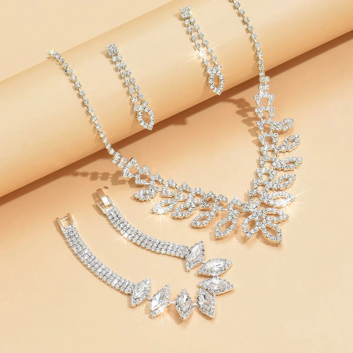 Shimmering Oval Diamond Necklace, Bracelet, and Earring Set